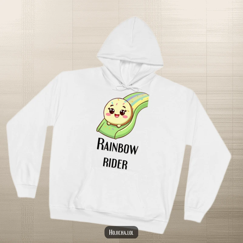 Funny matcha cookie character sliding down a sprinkle slide, printed on a cozy hoodie.