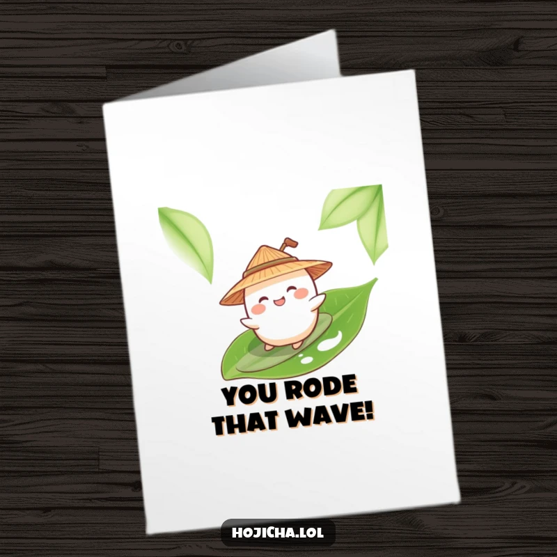 Funny Free Printable Giggling Mochi wearing a straw hat, surfing a green tea leaf to celebrate.