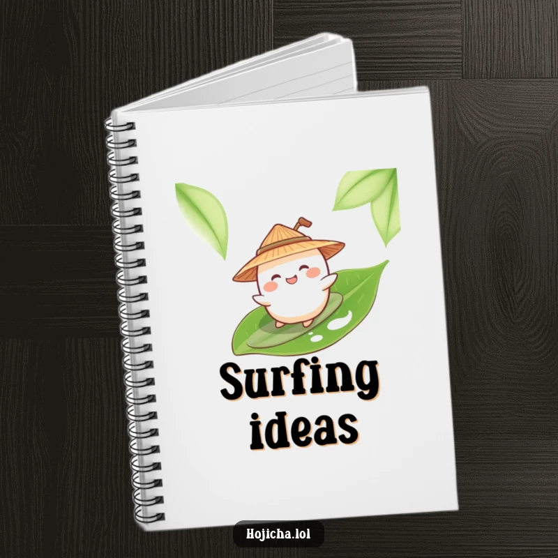 Funny mochi surfing a tea leaf, wearing a straw hat, on a notebook cover.